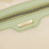 Bolso Mimi Mua efecto laminado verde pistacho